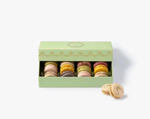 Elegant Green Festive 12 Macarons Gift Box from Ladurée UAE Featuring Iconic Branding and Celebration Design