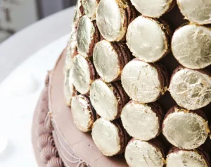 Luxurious Pyramid of 40 Gold Leaf Covered Chocolate Macarons from Ladurée UAE for Special Events