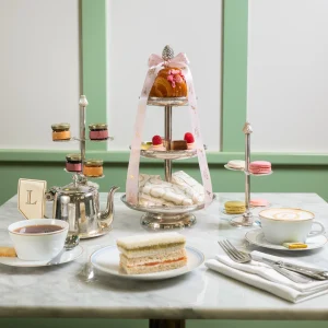 Ladurée classic afternoon tea with macarons, scones, and finger sandwiches